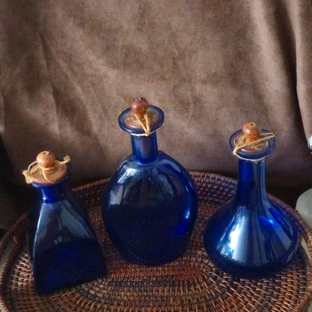 Set of 3 Cobalt bottles.